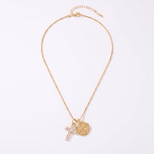 Load image into Gallery viewer, Collar Llena de Gracia con cadena dorada, dije de Sagrado Corazón y cruz pequeña con cristales en baño de oro 18K.
