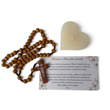 Load image into Gallery viewer, Llena de Gracia San Jose Dormido kit components including a wooden rosary, heart-shaped vanilla candle, and prayer card