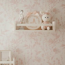 Cargar imagen en el visor de la galería, Llena de Gracia Virgen de la Salud resin figure with pink floral details displayed on a nursery wall shelf