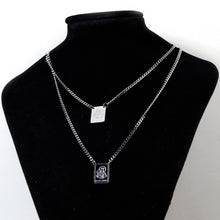Load image into Gallery viewer, Collar Llena de Gracia con dos escapularios de acero quirúrgico y rodio, diseño unisex de cadena larga.
