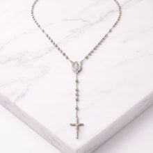 Cargar imagen en el visor de la galería, Llena de Gracia white gold laminated Catholic rosary with Virgin of Guadalupe charm and crucifix on marble surface
